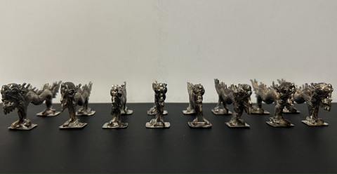Silver set of decorative dragons